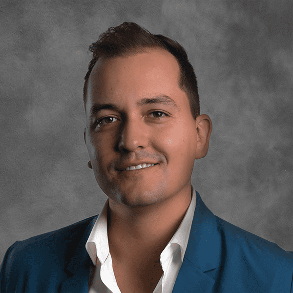 Cole Kutschinski Smiling Headshot Image