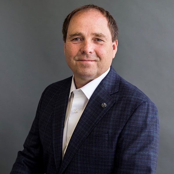 Doug Keith in a Black Suit Headshot Image